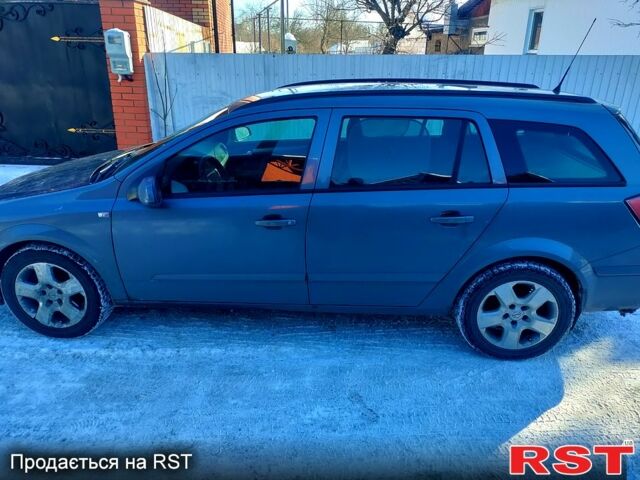 Серый Опель Астра, объемом двигателя 1.9 л и пробегом 324 тыс. км за 3700 $, фото 2 на Automoto.ua