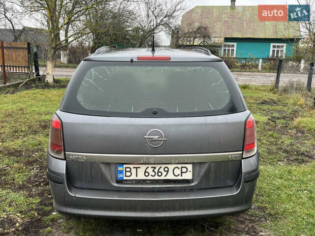 Сірий Опель Астра, об'ємом двигуна 1.25 л та пробігом 444 тис. км за 2600 $, фото 7 на Automoto.ua