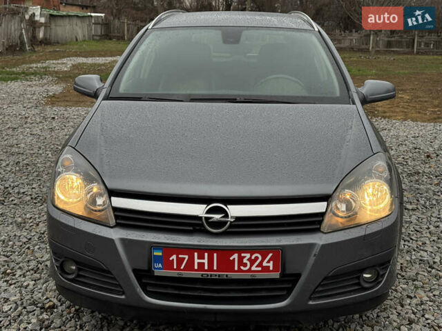 Серый Опель Астра, объемом двигателя 1.6 л и пробегом 310 тыс. км за 5000 $, фото 2 на Automoto.ua