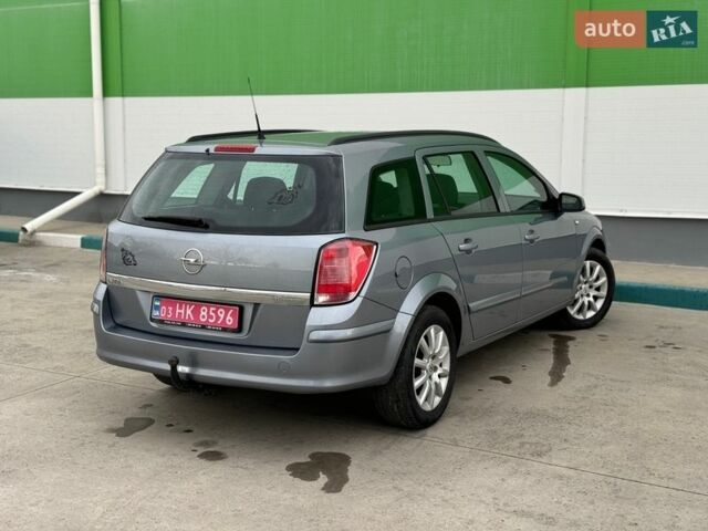 Серый Опель Астра, объемом двигателя 1.6 л и пробегом 154 тыс. км за 4900 $, фото 8 на Automoto.ua