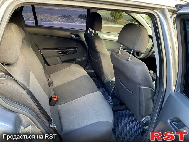 Серый Опель Астра, объемом двигателя 1.4 л и пробегом 243 тыс. км за 5200 $, фото 8 на Automoto.ua