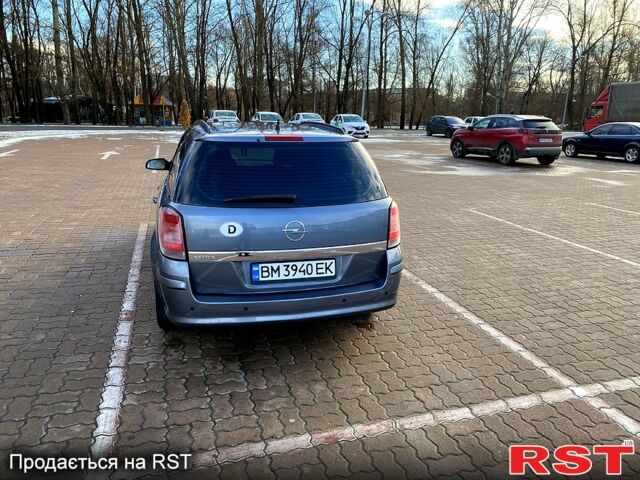 Серый Опель Астра, объемом двигателя 1.4 л и пробегом 243 тыс. км за 5200 $, фото 7 на Automoto.ua