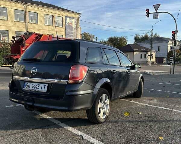 Серый Опель Астра, объемом двигателя 1.2 л и пробегом 323 тыс. км за 4200 $, фото 2 на Automoto.ua