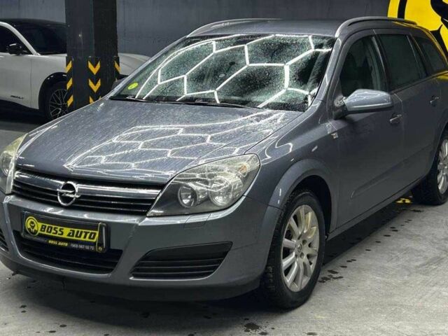 Серый Опель Астра, объемом двигателя 1.6 л и пробегом 249 тыс. км за 5700 $, фото 2 на Automoto.ua