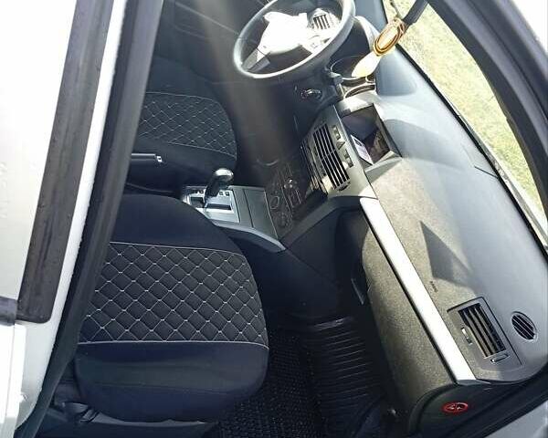 Серый Опель Астра, объемом двигателя 1.9 л и пробегом 258 тыс. км за 4400 $, фото 7 на Automoto.ua