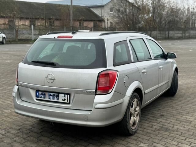 Серый Опель Астра, объемом двигателя 1.9 л и пробегом 300 тыс. км за 2500 $, фото 6 на Automoto.ua
