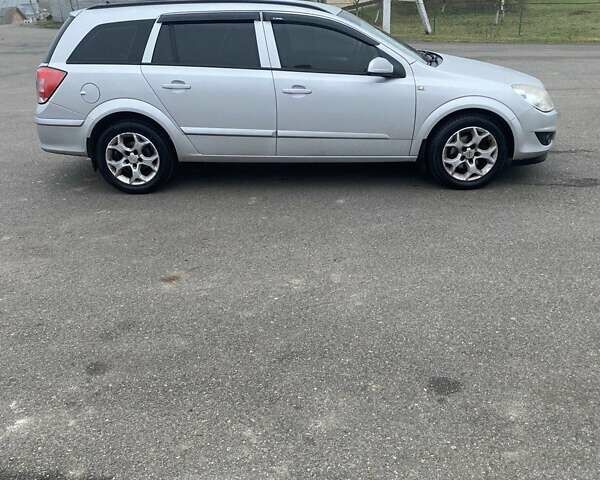 Серый Опель Астра, объемом двигателя 1.6 л и пробегом 289 тыс. км за 4750 $, фото 5 на Automoto.ua