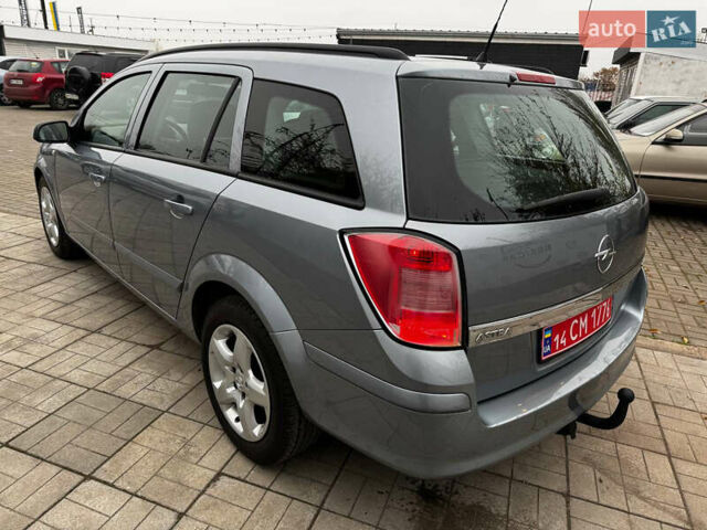 Серый Опель Астра, объемом двигателя 1.6 л и пробегом 190 тыс. км за 5900 $, фото 3 на Automoto.ua