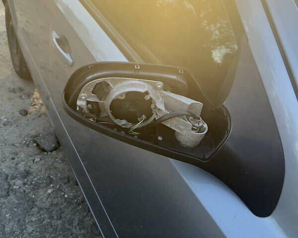 Серый Опель Астра, объемом двигателя 1.3 л и пробегом 432 тыс. км за 4000 $, фото 5 на Automoto.ua