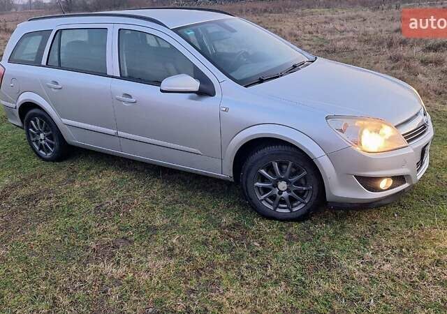 Серый Опель Астра, объемом двигателя 1.6 л и пробегом 239 тыс. км за 5200 $, фото 2 на Automoto.ua