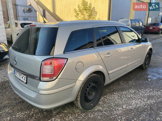 Серый Опель Астра, объемом двигателя 1.6 л и пробегом 210 тыс. км за 4699 $, фото 5 на Automoto.ua