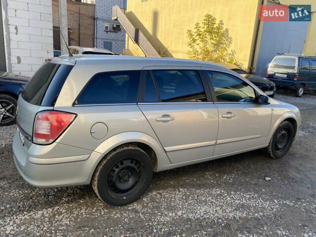 Серый Опель Астра, объемом двигателя 1.6 л и пробегом 210 тыс. км за 4699 $, фото 6 на Automoto.ua