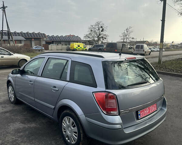 Серый Опель Астра, объемом двигателя 1.6 л и пробегом 212 тыс. км за 5900 $, фото 5 на Automoto.ua