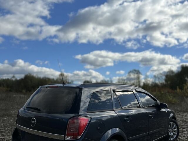 Серый Опель Астра, объемом двигателя 1.9 л и пробегом 241 тыс. км за 6000 $, фото 2 на Automoto.ua