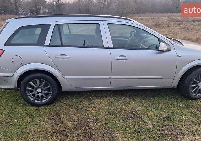 Серый Опель Астра, объемом двигателя 1.6 л и пробегом 239 тыс. км за 5200 $, фото 3 на Automoto.ua