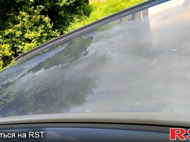 Серый Опель Астра, объемом двигателя 1.6 л и пробегом 326 тыс. км за 3700 $, фото 3 на Automoto.ua