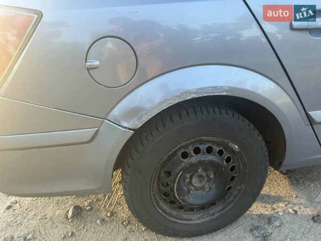 Серый Опель Астра, объемом двигателя 1.3 л и пробегом 432 тыс. км за 4000 $, фото 6 на Automoto.ua