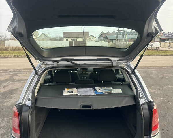 Серый Опель Астра, объемом двигателя 1.6 л и пробегом 212 тыс. км за 5900 $, фото 10 на Automoto.ua