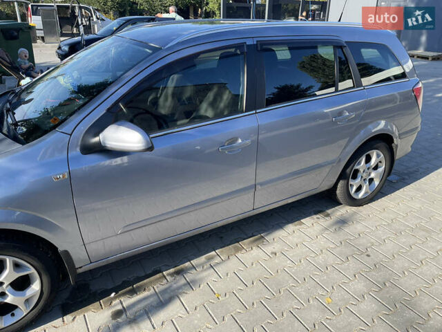 Серый Опель Астра, объемом двигателя 1.6 л и пробегом 209 тыс. км за 4800 $, фото 4 на Automoto.ua