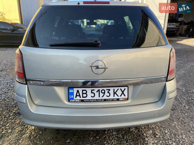 Серый Опель Астра, объемом двигателя 1.6 л и пробегом 210 тыс. км за 4699 $, фото 4 на Automoto.ua