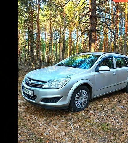 Серый Опель Астра, объемом двигателя 1.4 л и пробегом 33000 тыс. км за 4600 $, фото 6 на Automoto.ua