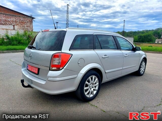Серый Опель Астра, объемом двигателя 1.6 л и пробегом 203 тыс. км за 5900 $, фото 3 на Automoto.ua
