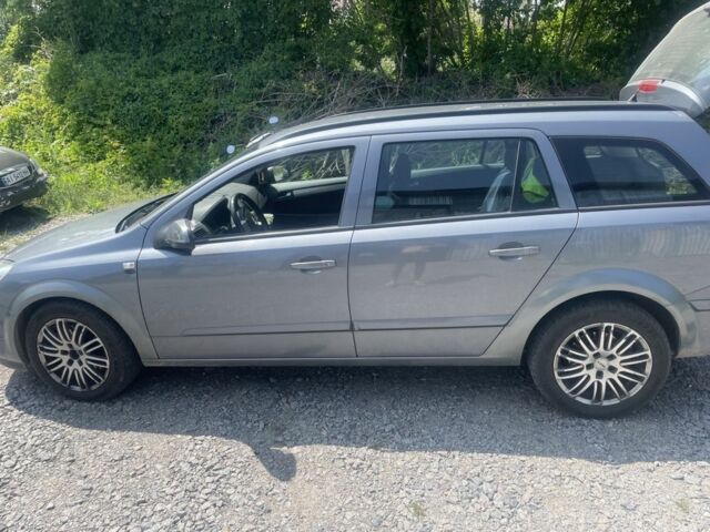 Серый Опель Астра, объемом двигателя 1.9 л и пробегом 450 тыс. км за 5000 $, фото 3 на Automoto.ua