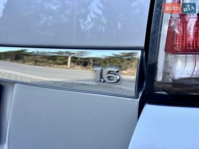 Серый Опель Астра, объемом двигателя 1.6 л и пробегом 218 тыс. км за 5250 $, фото 21 на Automoto.ua