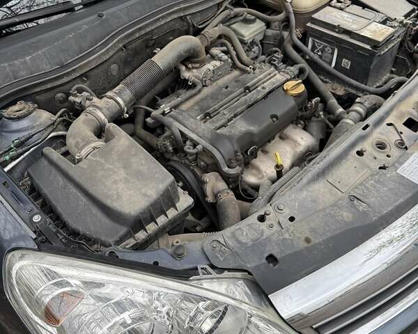 Серый Опель Астра, объемом двигателя 1.36 л и пробегом 268 тыс. км за 5000 $, фото 8 на Automoto.ua