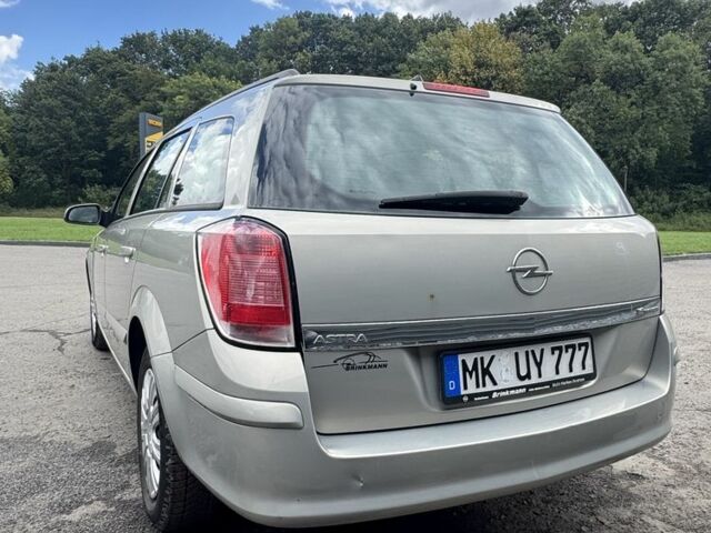 Серый Опель Астра, объемом двигателя 1.6 л и пробегом 205 тыс. км за 3999 $, фото 5 на Automoto.ua
