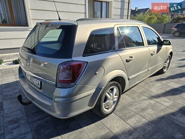 Серый Опель Астра, объемом двигателя 1.3 л и пробегом 238 тыс. км за 4800 $, фото 4 на Automoto.ua