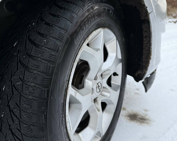 Серый Опель Астра, объемом двигателя 1.9 л и пробегом 428 тыс. км за 5800 $, фото 3 на Automoto.ua