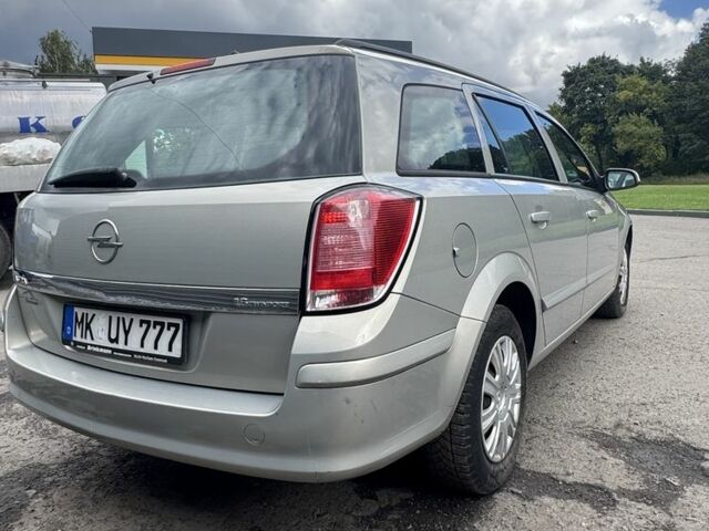 Серый Опель Астра, объемом двигателя 1.6 л и пробегом 205 тыс. км за 3999 $, фото 4 на Automoto.ua