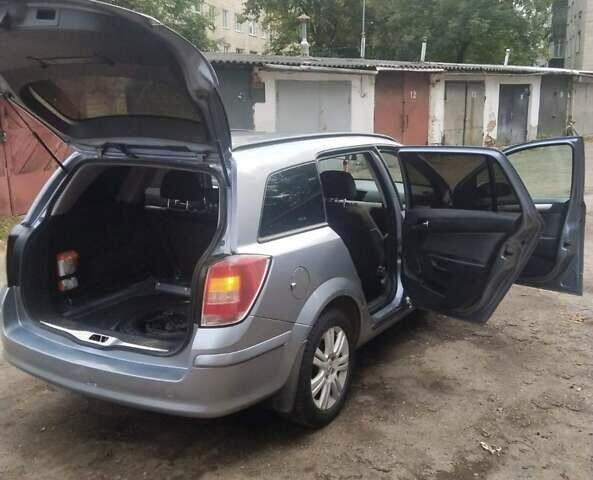 Сірий Опель Астра, об'ємом двигуна 1.69 л та пробігом 238 тис. км за 4250 $, фото 7 на Automoto.ua