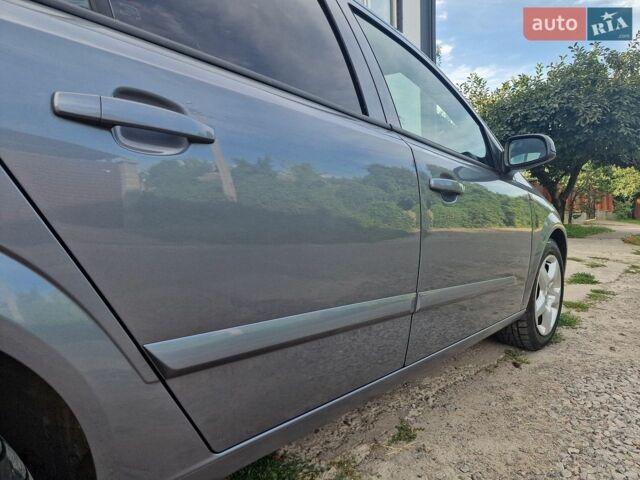 Серый Опель Астра, объемом двигателя 1.6 л и пробегом 230 тыс. км за 4500 $, фото 11 на Automoto.ua