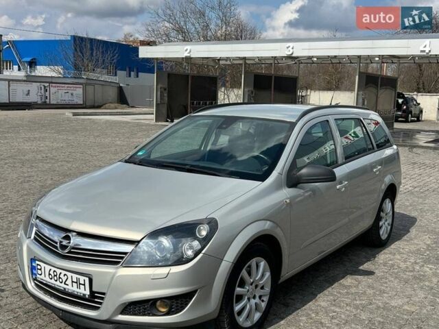 Серый Опель Астра, объемом двигателя 1.6 л и пробегом 242 тыс. км за 5600 $, фото 2 на Automoto.ua