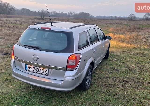 Серый Опель Астра, объемом двигателя 1.6 л и пробегом 239 тыс. км за 5200 $, фото 4 на Automoto.ua