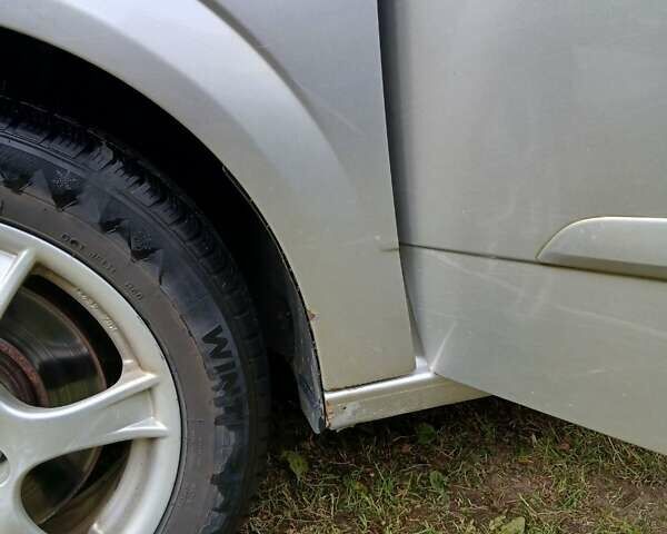 Серый Опель Астра, объемом двигателя 1.7 л и пробегом 320 тыс. км за 3700 $, фото 5 на Automoto.ua