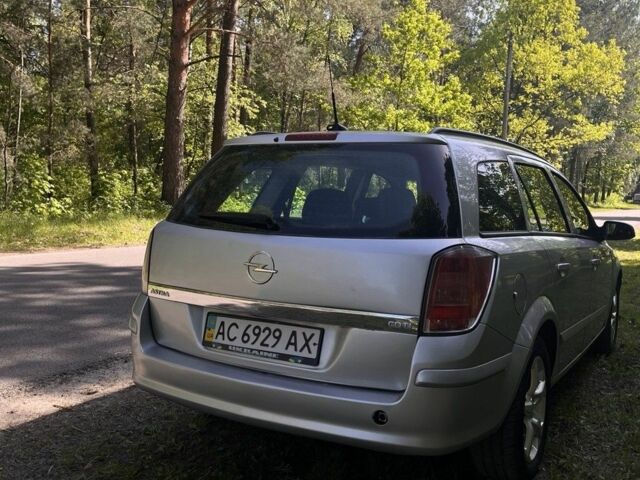 Серый Опель Астра, объемом двигателя 1.2 л и пробегом 215 тыс. км за 4700 $, фото 3 на Automoto.ua