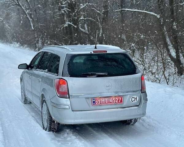 Серый Опель Астра, объемом двигателя 1.6 л и пробегом 160 тыс. км за 4999 $, фото 12 на Automoto.ua