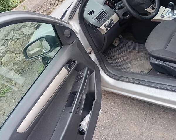 Серый Опель Астра, объемом двигателя 1.6 л и пробегом 385 тыс. км за 4300 $, фото 3 на Automoto.ua