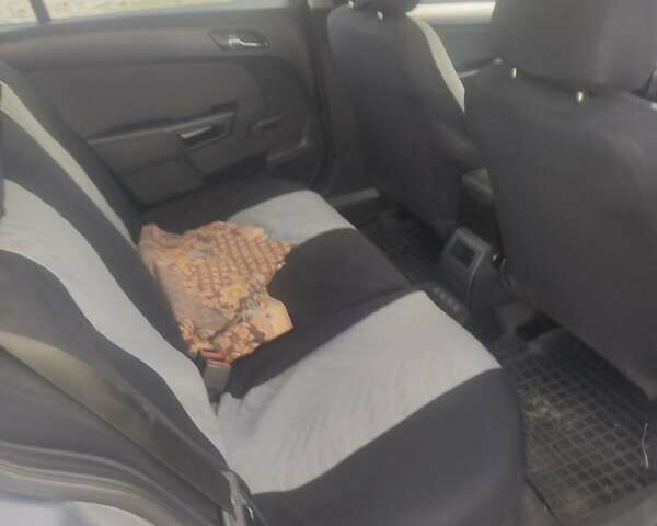 Серый Опель Астра, объемом двигателя 1.3 л и пробегом 280 тыс. км за 4000 $, фото 8 на Automoto.ua