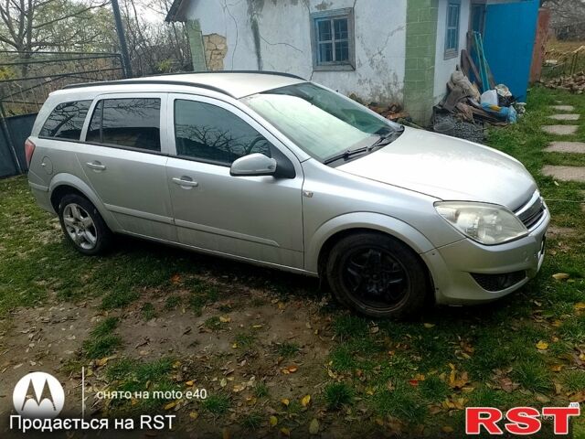 Серый Опель Астра, объемом двигателя 1.9 л и пробегом 400 тыс. км за 4000 $, фото 2 на Automoto.ua