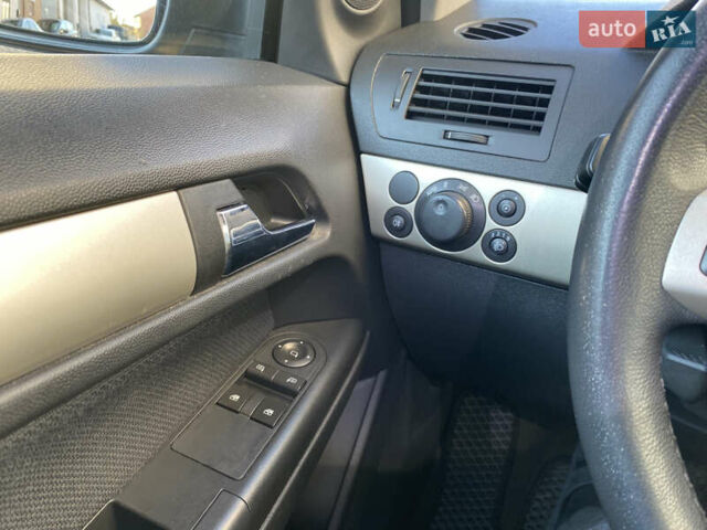 Серый Опель Астра, объемом двигателя 1.6 л и пробегом 210 тыс. км за 4699 $, фото 14 на Automoto.ua