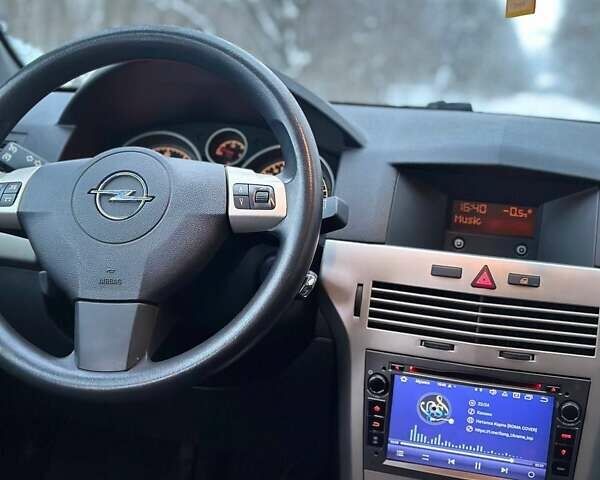 Серый Опель Астра, объемом двигателя 1.6 л и пробегом 160 тыс. км за 4999 $, фото 25 на Automoto.ua