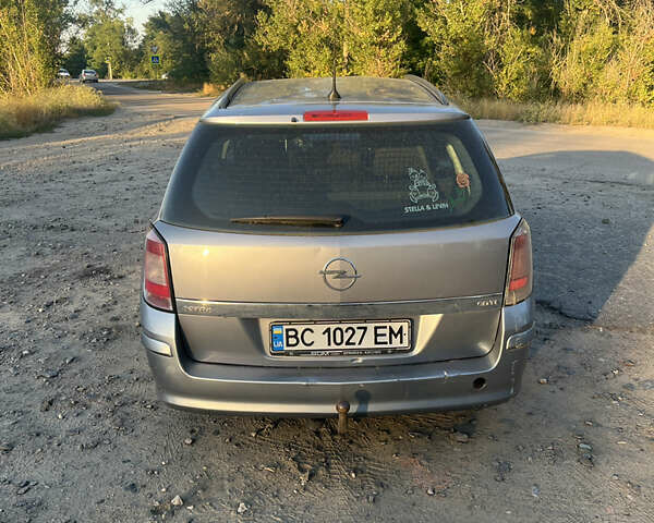 Серый Опель Астра, объемом двигателя 1.3 л и пробегом 432 тыс. км за 4000 $, фото 2 на Automoto.ua