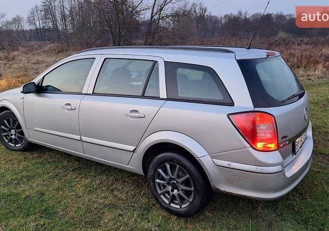 Серый Опель Астра, объемом двигателя 1.6 л и пробегом 239 тыс. км за 5200 $, фото 6 на Automoto.ua