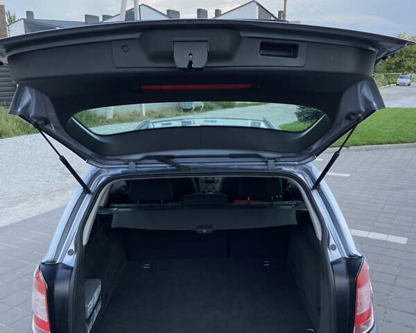 Серый Опель Астра, объемом двигателя 1.6 л и пробегом 214 тыс. км за 5700 $, фото 14 на Automoto.ua