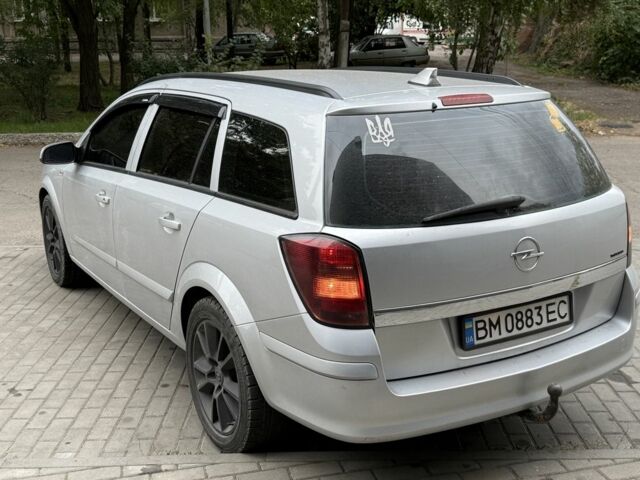 Серый Опель Астра, объемом двигателя 1.7 л и пробегом 228 тыс. км за 5600 $, фото 3 на Automoto.ua