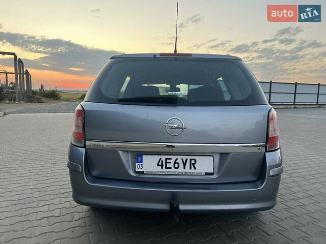 Серый Опель Астра, объемом двигателя 1.6 л и пробегом 234 тыс. км за 5700 $, фото 14 на Automoto.ua